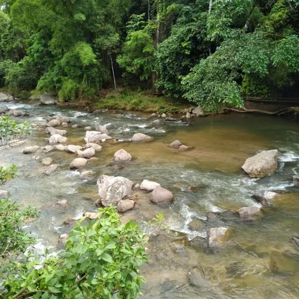 Casa da cachoeira na beira do Rio Sana