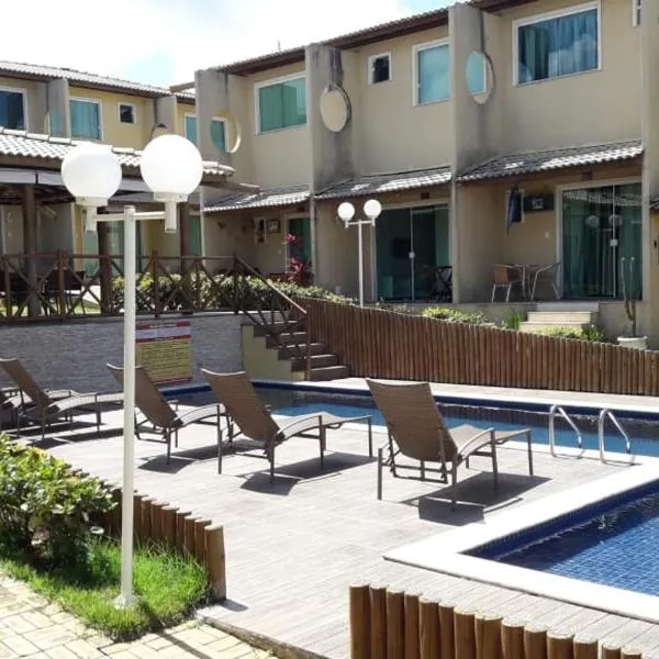 Casa agradável em condomínio perto da praia.