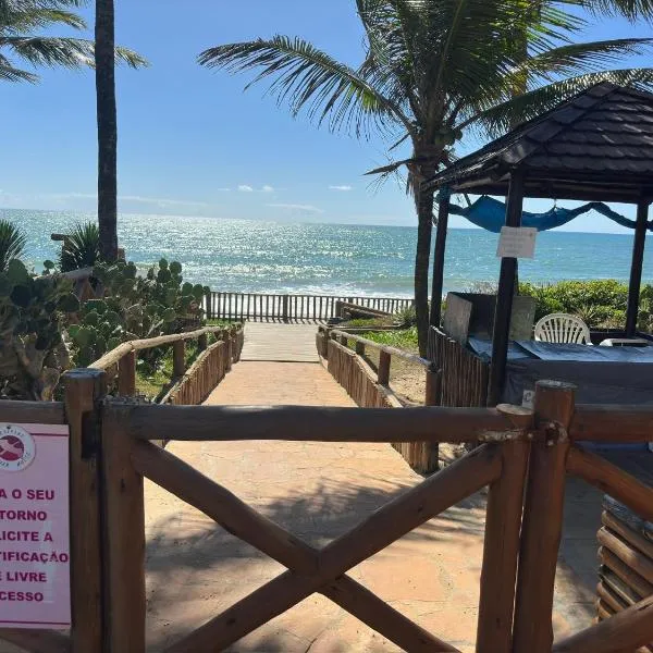 Flat Guarajuba 4 quartos térreo à Beira Mar - pé na areia - governança com arrumadeira e Wi Fi inclusos