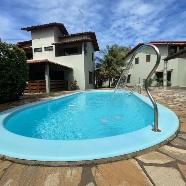 Casasveraneio casa top com 2 suítes com ar condicionado a 100 m da Praia - Barra de São Miguel, 7 minutos do gunga e 3 da praia bonita e conchas ! Área gourmet particular com churrasqueira , chuveirão !condomínio com muito verde,piscina de 10m!